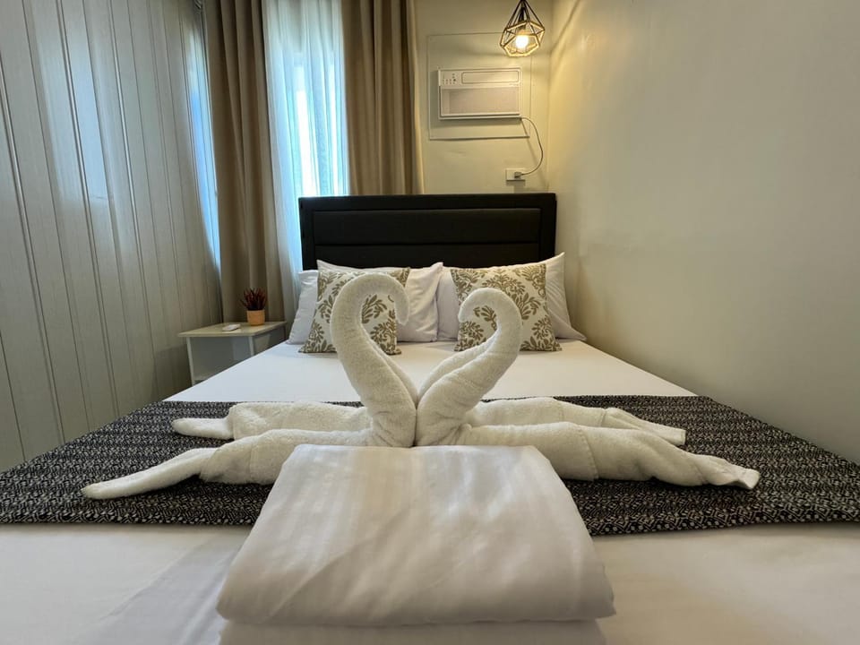 Bed, Bedroom, towels, air conditioner