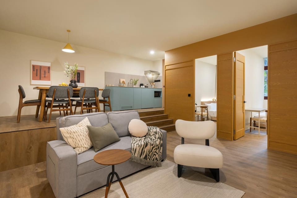 Kitchen or kitchenette, Living room, Seating area, Dining area, stove, washing machine, air conditioner