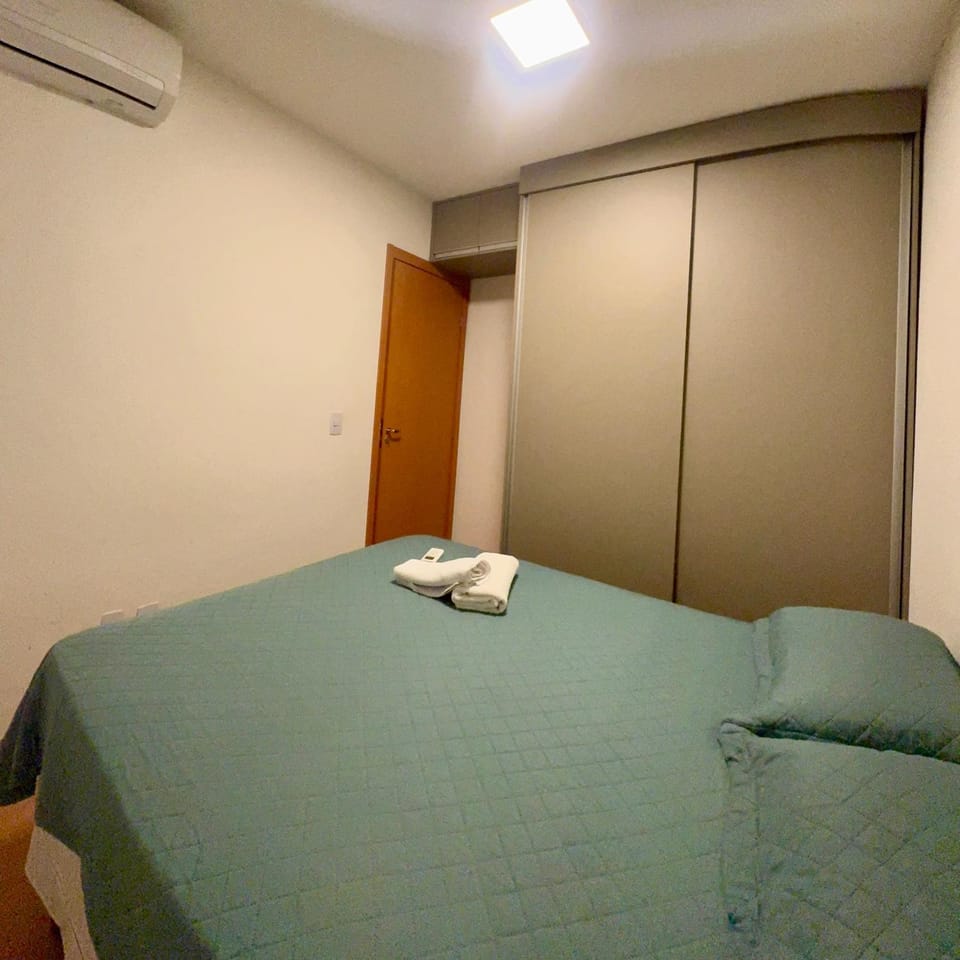 Bed, Bedroom, towels, wardrobe, air conditioner