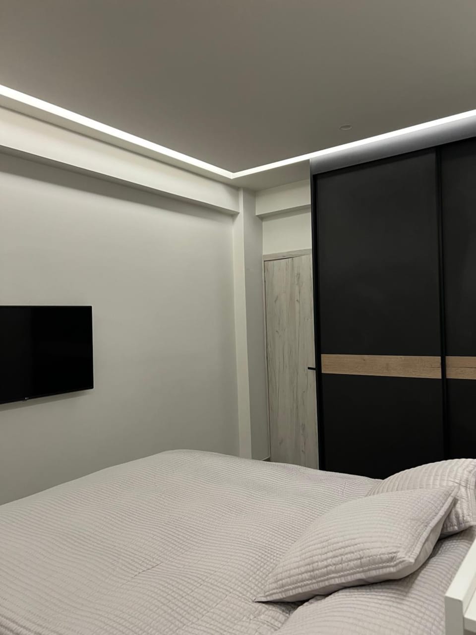 Bedroom, flat iron, towels, wardrobe