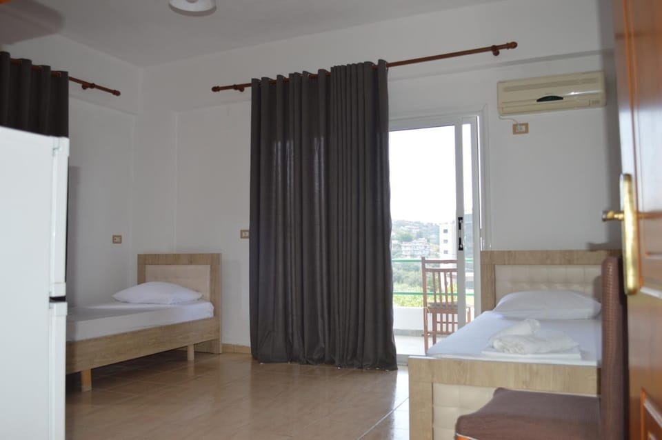 Bed, Photo of the whole room, Bedroom, towels, air conditioner
