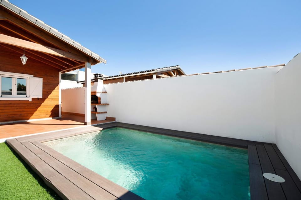 Property building, Living room, Swimming pool
