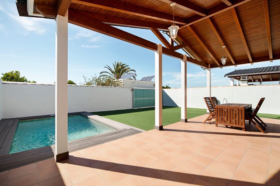 Property building, Living room, Swimming pool