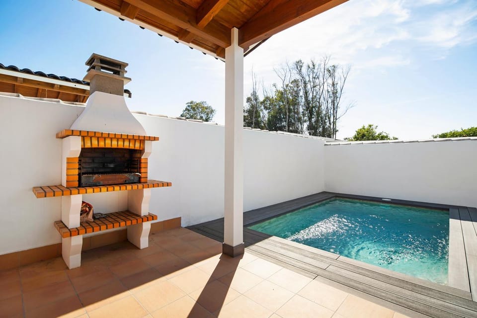 Property building, Living room, Swimming pool