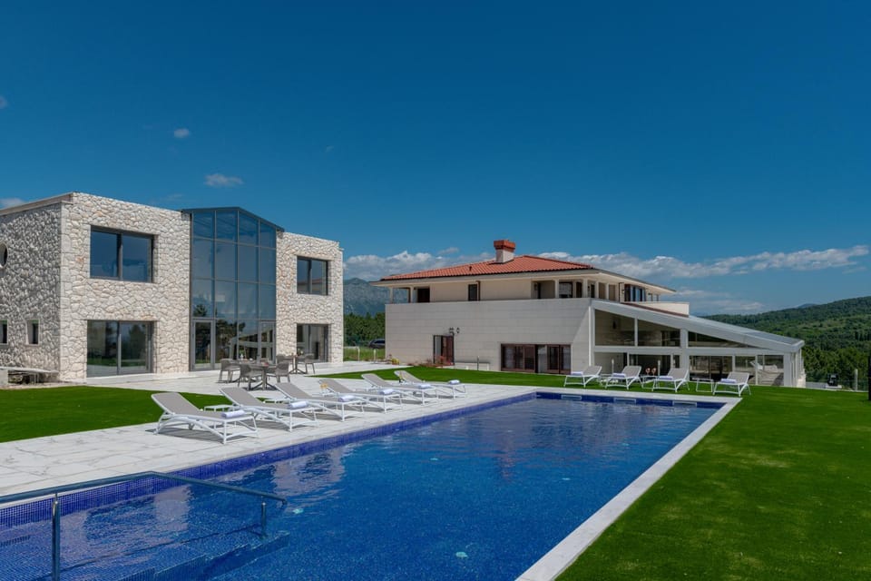 Property building, Day, Natural landscape, Pool view, Swimming pool, Swimming pool, sunbed