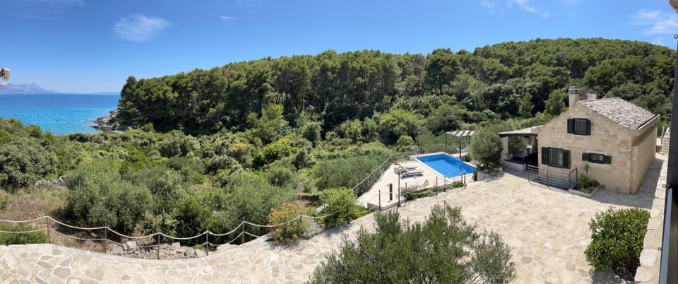 Property building, Spring, Day, Natural landscape, Beach, Mountain view, Pool view, Sea view, Swimming pool