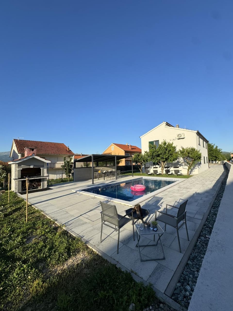 Property building, Day, Natural landscape, Pool view, Swimming pool, sunbed