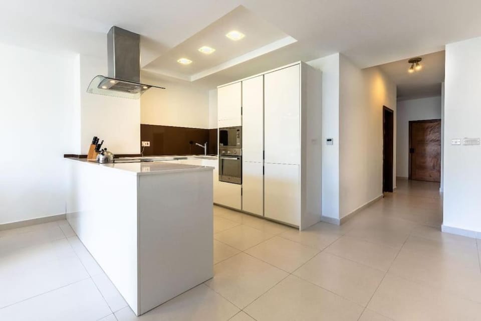 Kitchen or kitchenette, oven, stove