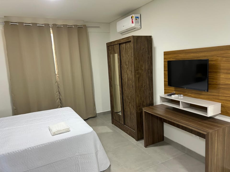 Bed, TV and multimedia, Bedroom, towels, wardrobe, air conditioner
