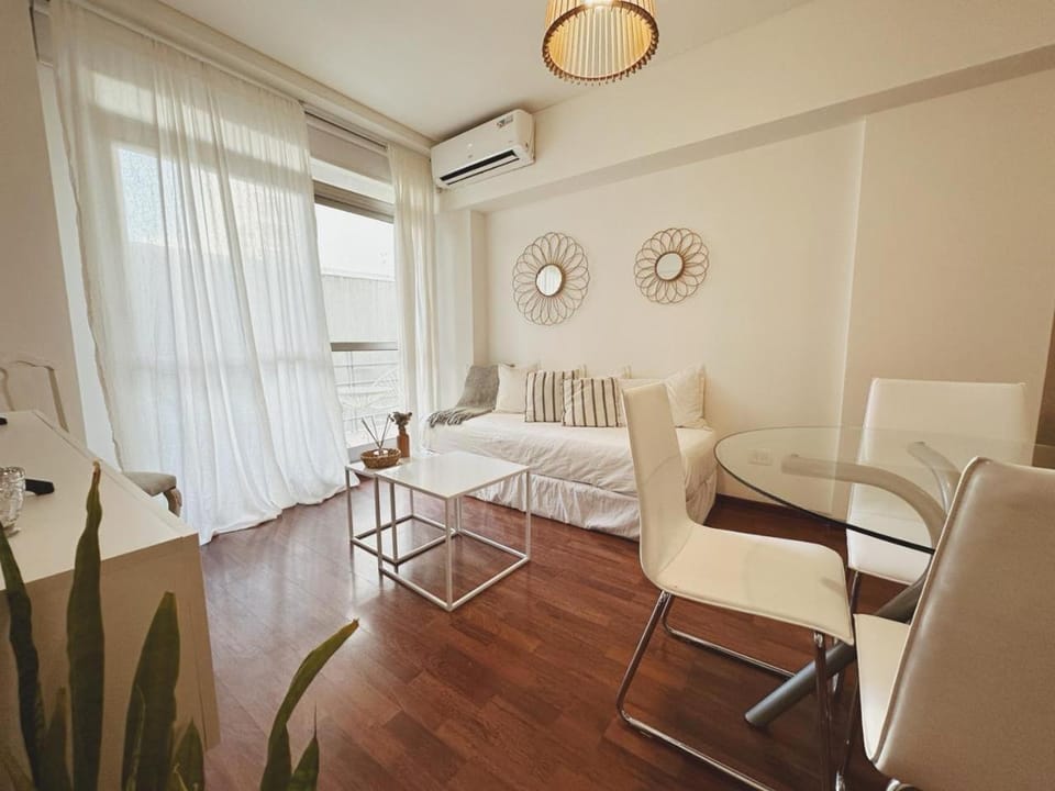 Bed, Living room, Photo of the whole room, Seating area, towels, air conditioner