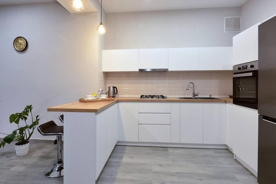 Kitchen or kitchenette, oven, stove