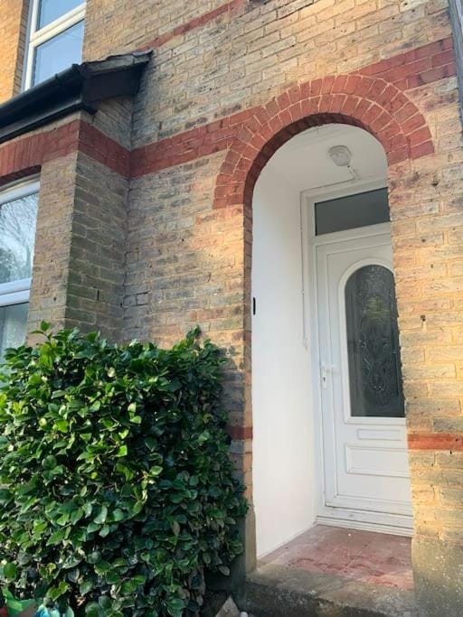 Property building, Facade/entrance, Day, Garden