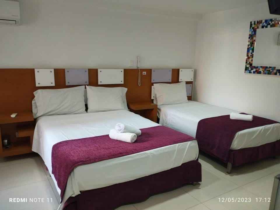 Bed, Photo of the whole room, Bedroom, towels, air conditioner