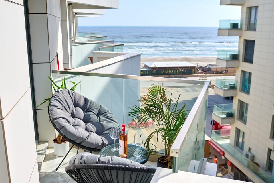 Property building, View (from property/room), Balcony/Terrace, Seating area, Sea view