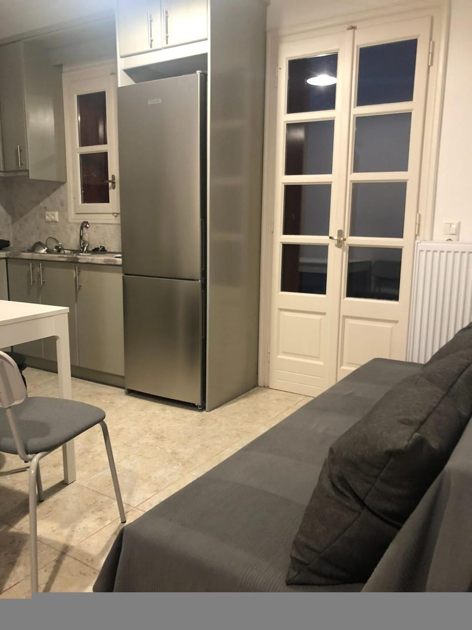 Kitchen or kitchenette, Living room, Seating area, oven, stove