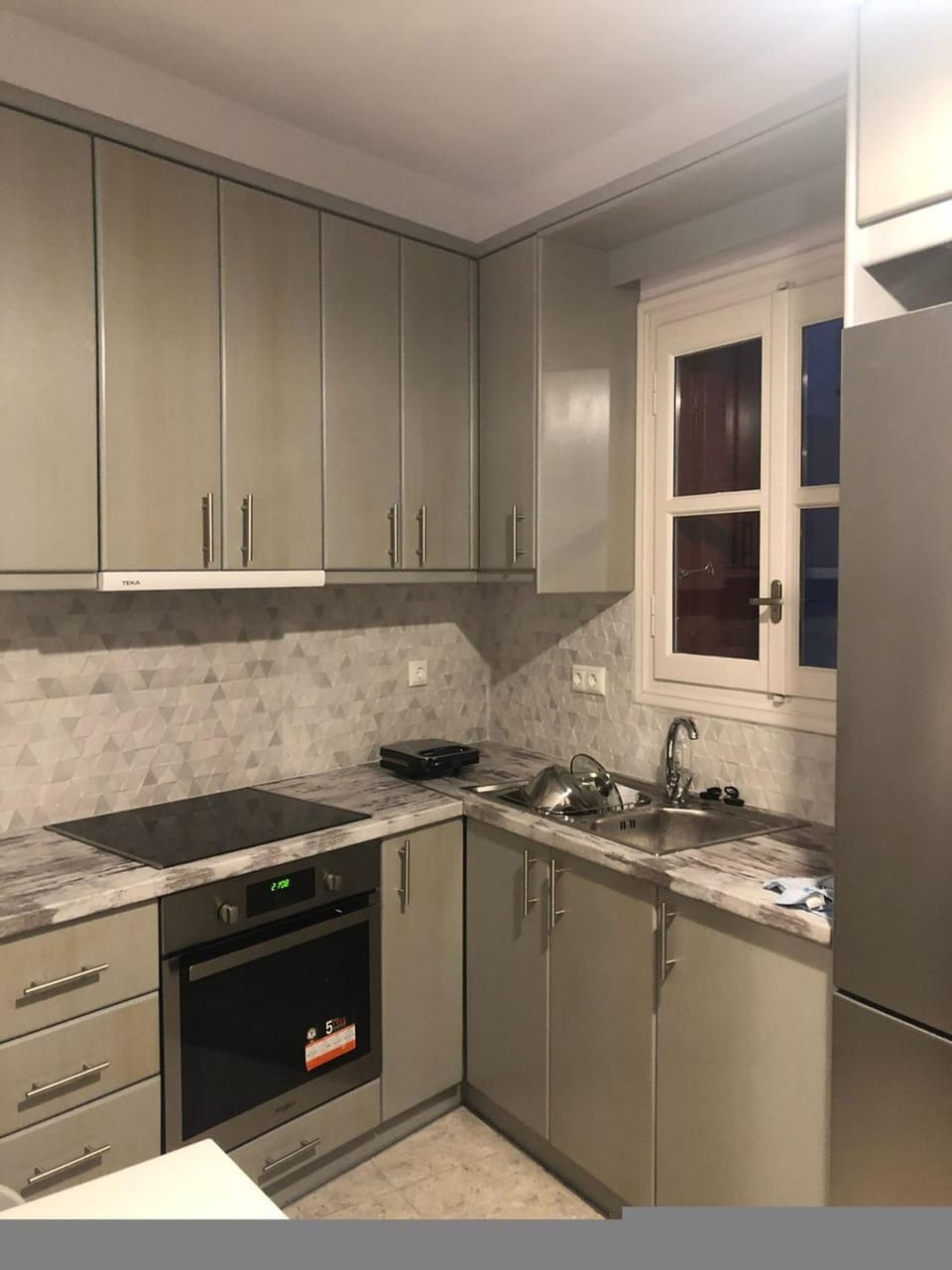 Kitchen or kitchenette, oven, stove