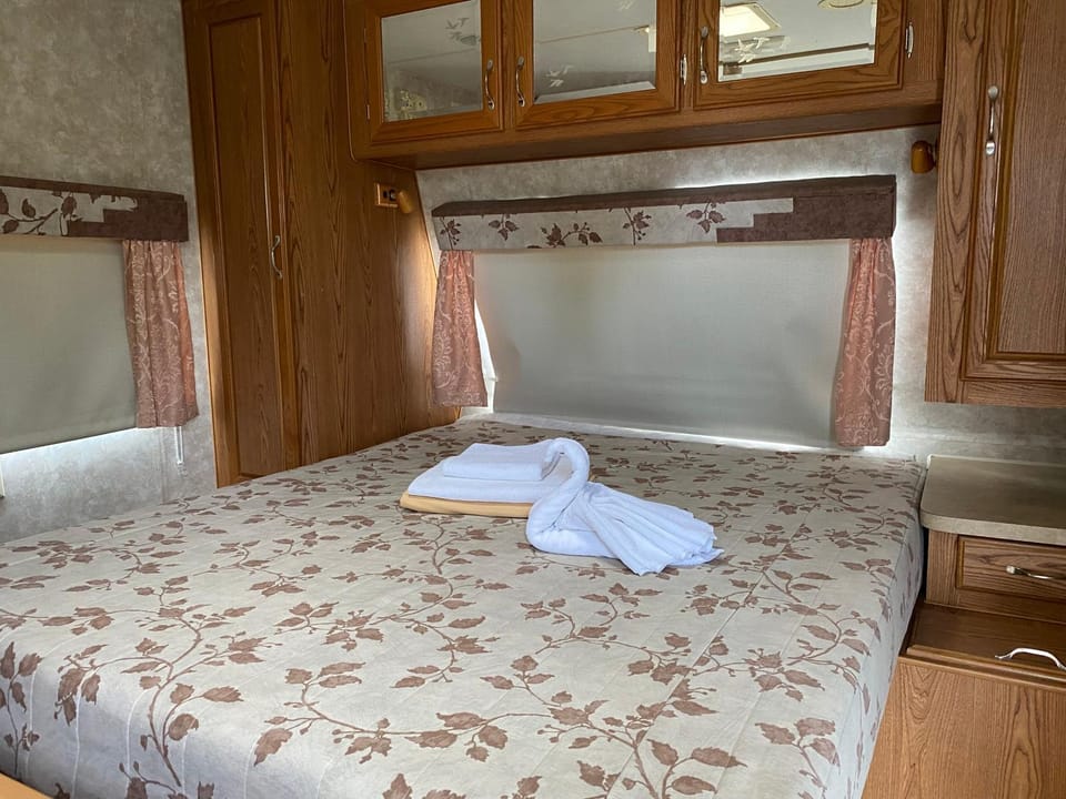 Bed, Bedroom, Garden view, towels, wardrobe