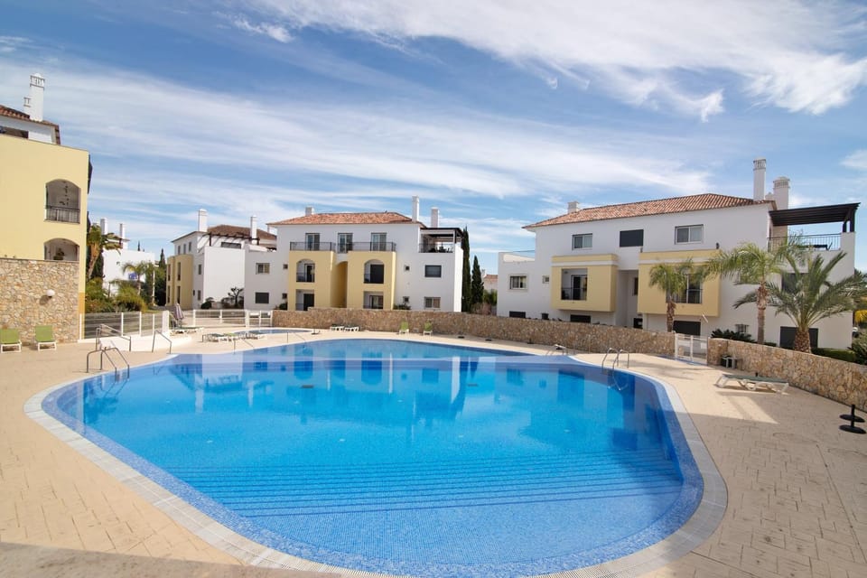 Property building, Living room, Swimming pool