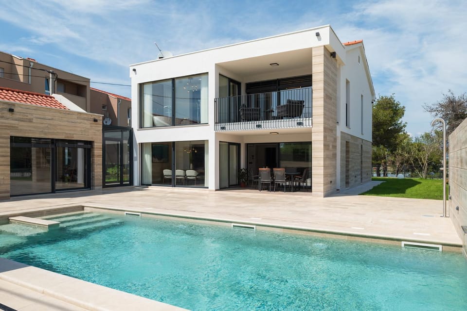 Property building, Patio, Day, Pool view, Swimming pool
