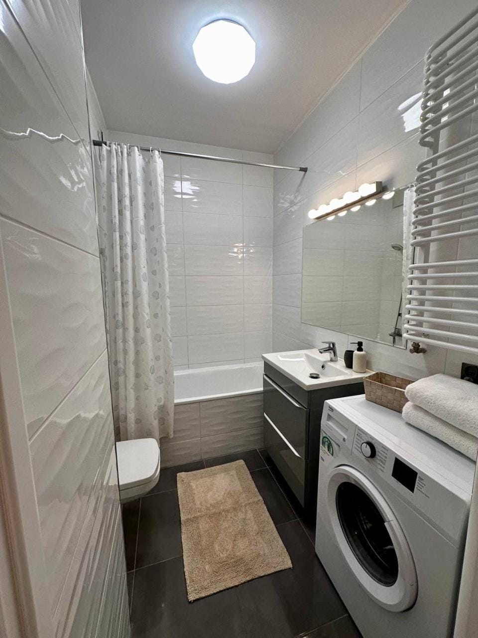 Shower, towels, washing machine, dryer