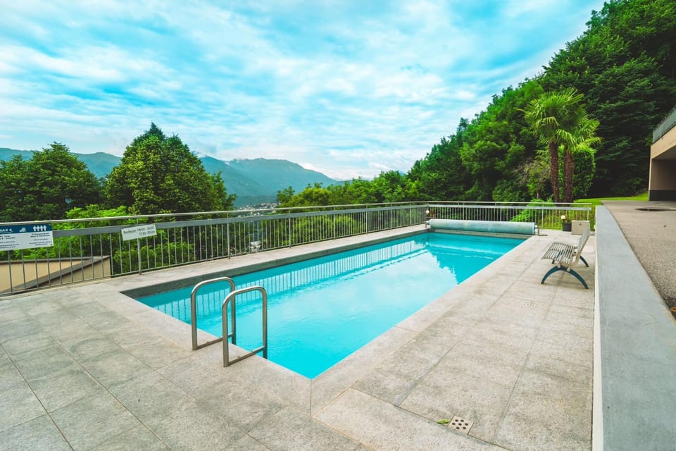 Nearby landmark, Spring, Day, Natural landscape, Mountain view, Pool view, Swimming pool, sunbed