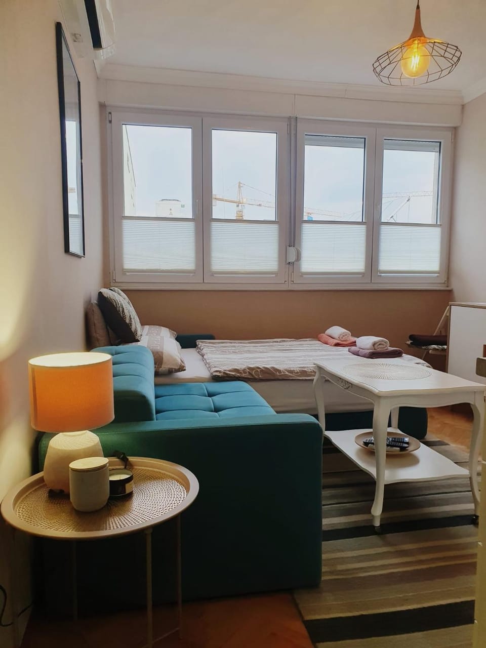 Bed, Living room, Seating area, Bedroom