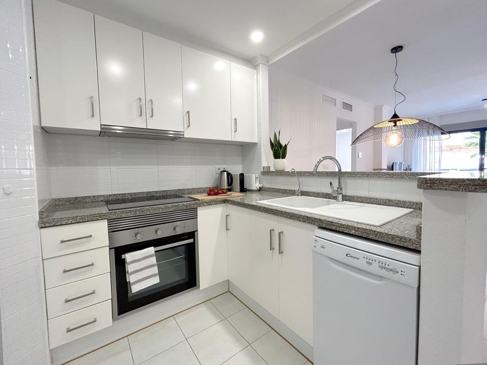 Kitchen or kitchenette, stove, toaster