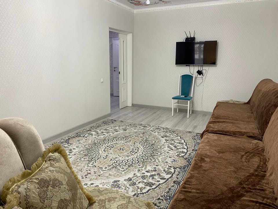 уютная квартира в элитном доме в центре города. Район:Дворец спорта Apartment in Almaty Region, Kazakhstan