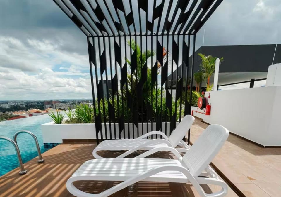 Patio, Living room, Pool view, Swimming pool, sunbed