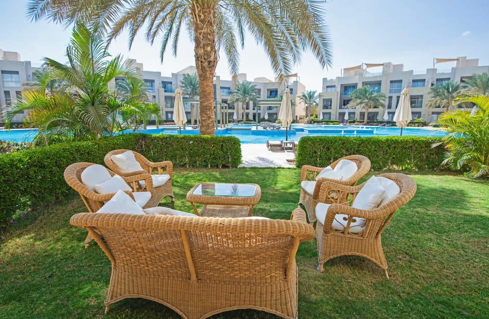 Property building, Patio, Spring, Day, Garden, Living room, Seating area, Garden view, Pool view, Swimming pool, sunbed