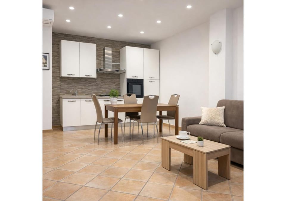 Kitchen or kitchenette, Living room, Seating area, Dining area