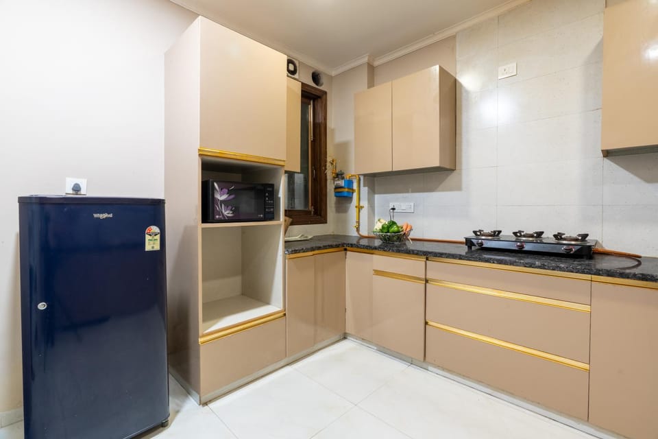 Kitchen or kitchenette, Food, furniture, microwave, stove, wardrobe