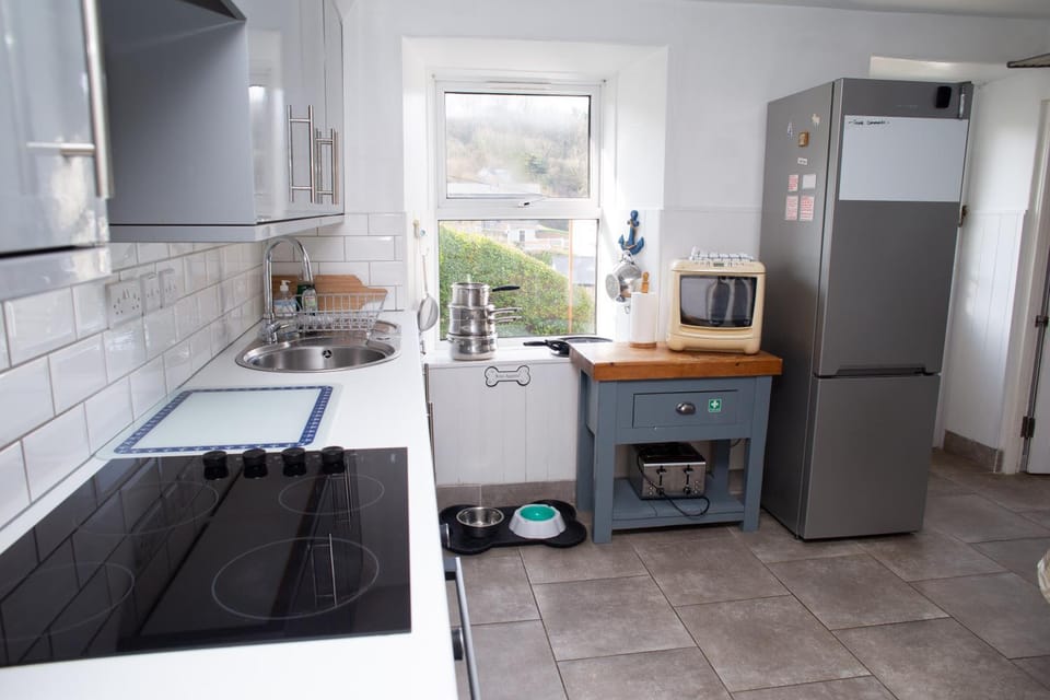 Kitchen or kitchenette, microwave, oven, stove, toaster