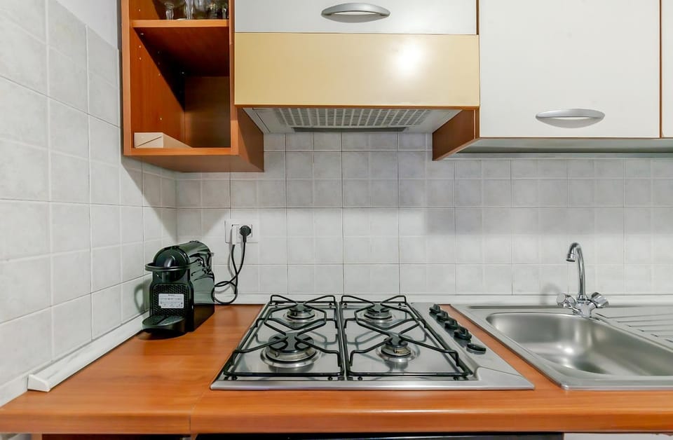 Kitchen or kitchenette, stove