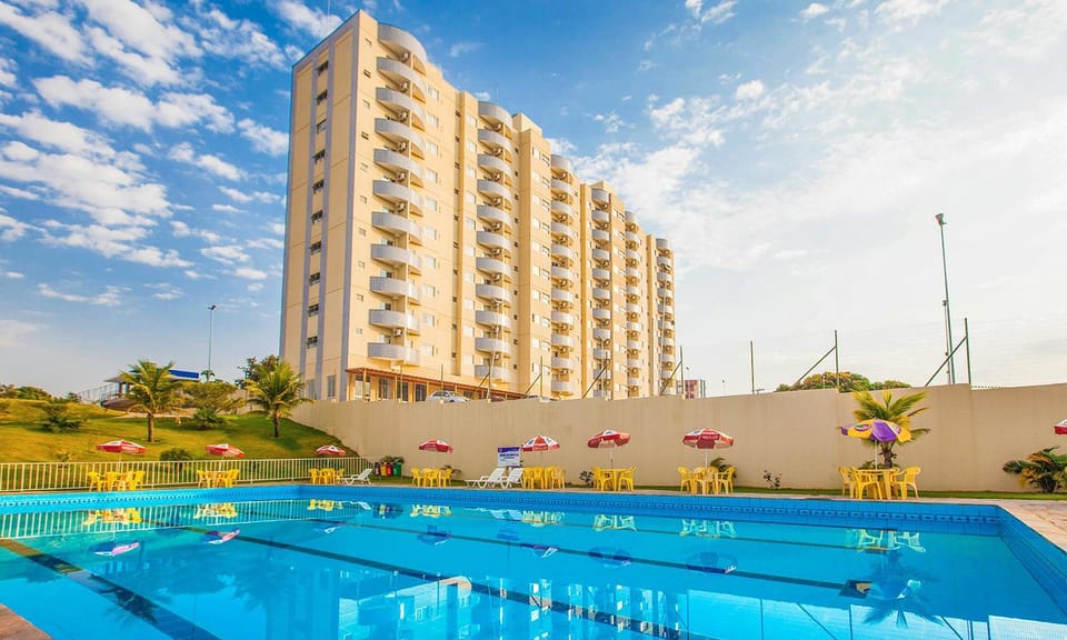 Property building, Day, Pool view, Swimming pool, sunbed