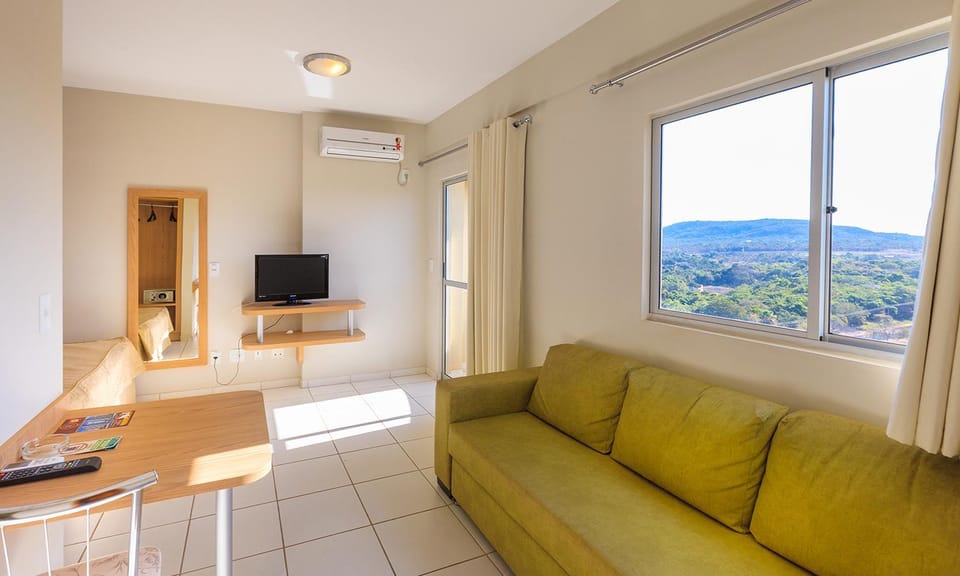 Communal lounge/ TV room, Natural landscape, TV and multimedia, Living room, Seating area, Evening entertainment, Mountain view, air conditioner