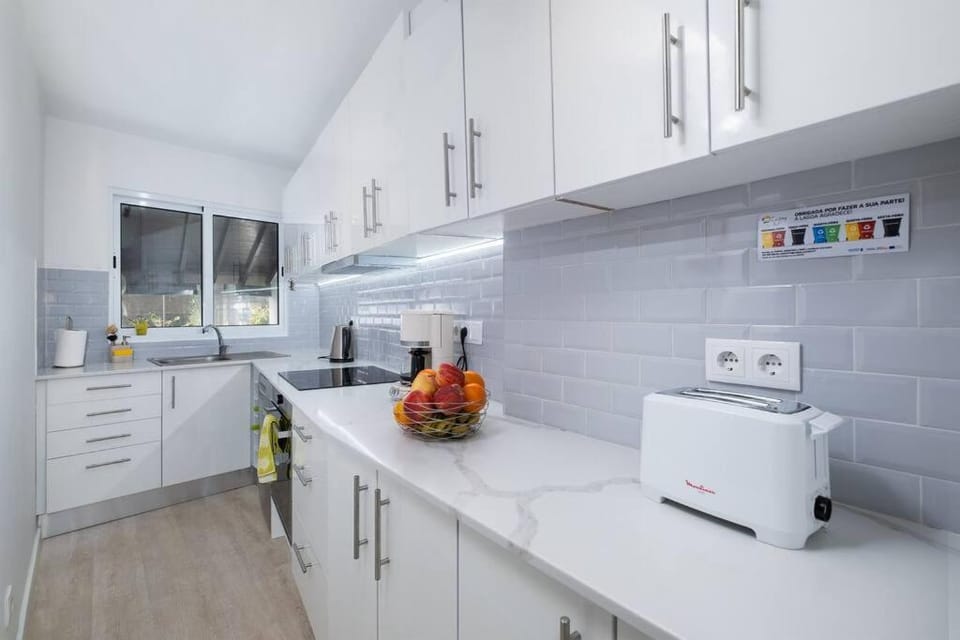 Kitchen or kitchenette, oven, stove, toaster