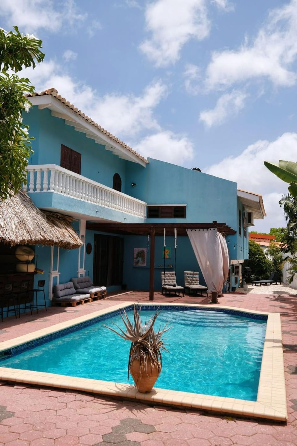 Property building, Patio, Pool view, Swimming pool, sunbed