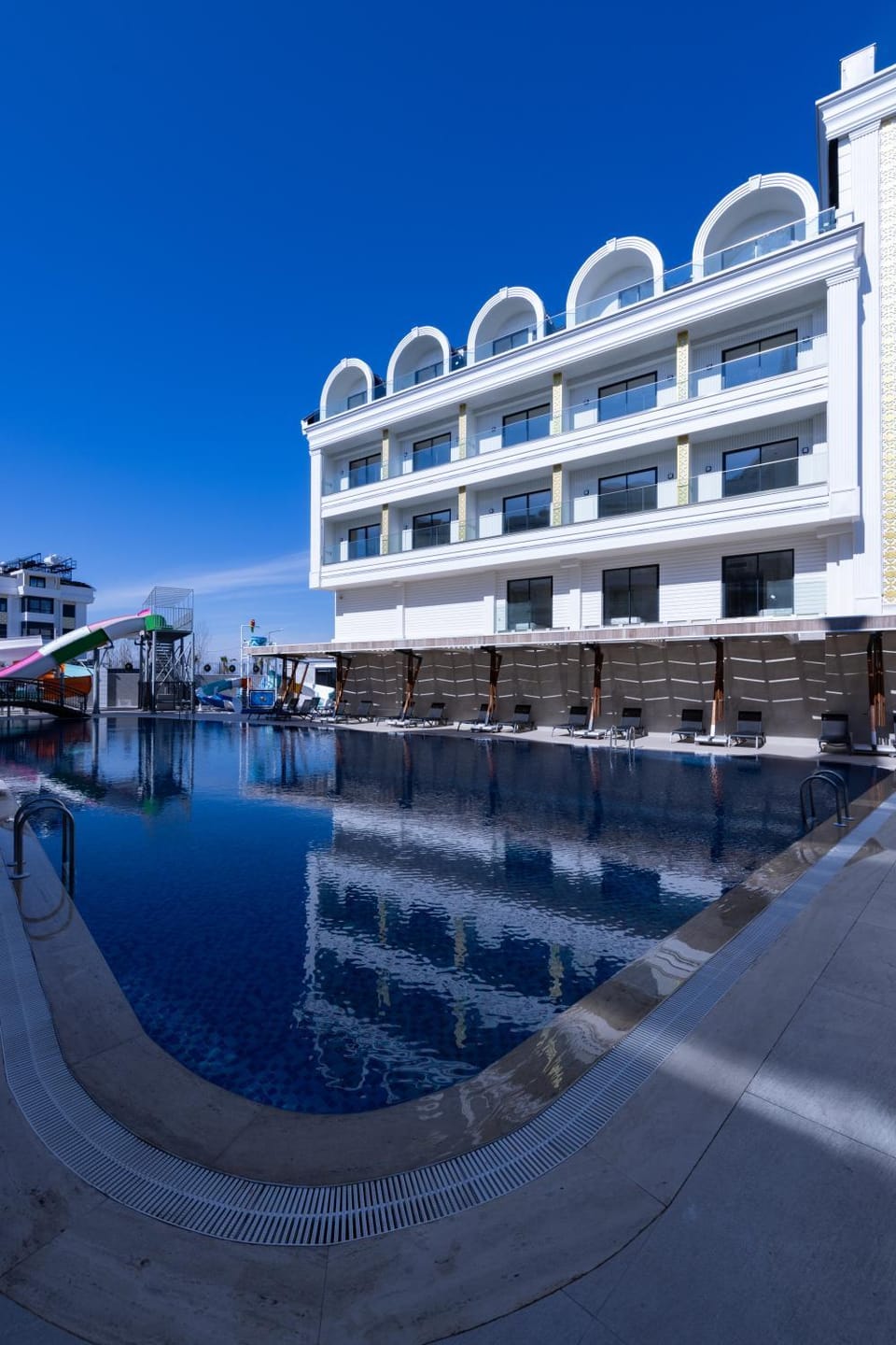 Property building, Day, Natural landscape, Pool view, Swimming pool