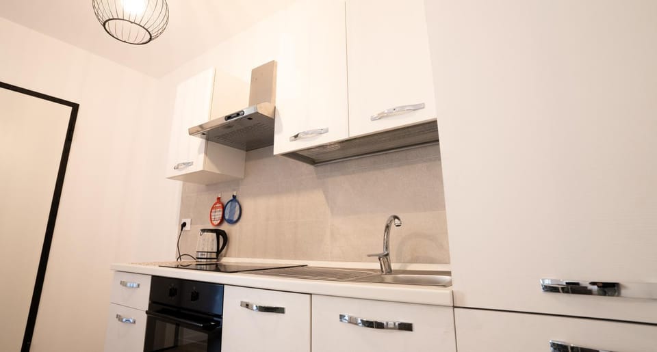 Kitchen or kitchenette, stove