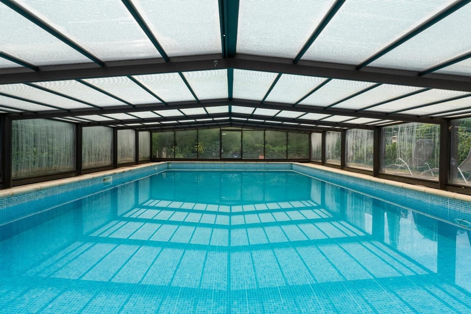 Property building, Living room, Swimming pool
