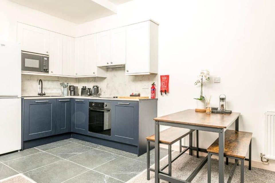 Dining area, microwave, oven, stove, toaster