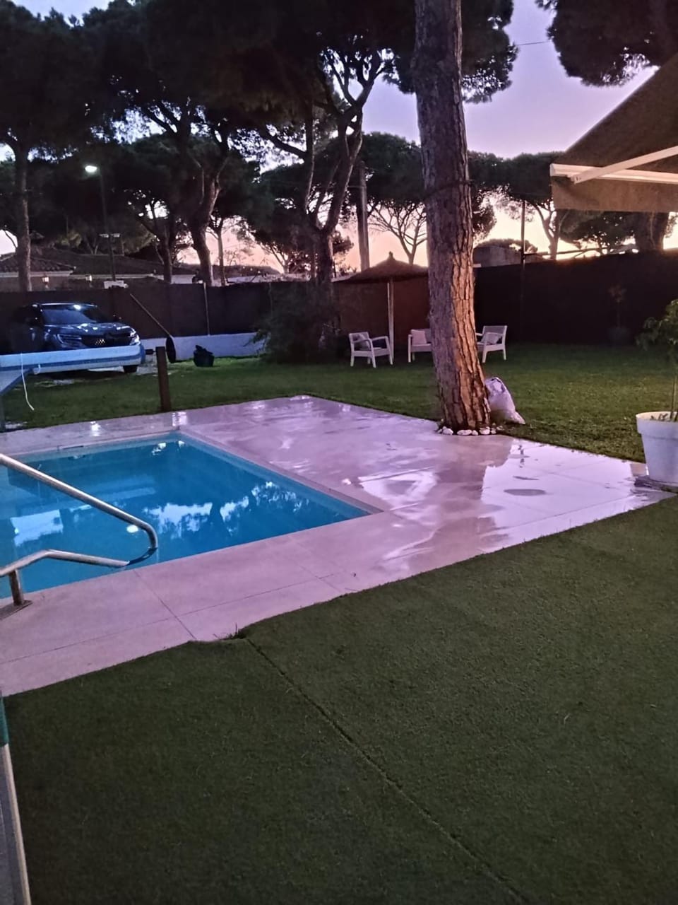 Property building, Living room, Swimming pool