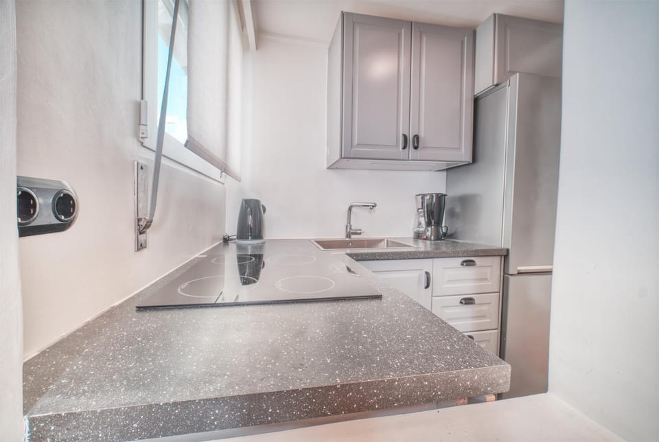 Kitchen or kitchenette, stove