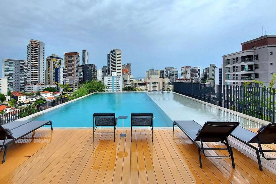 Property building, View (from property/room), Balcony/Terrace, City view, Pool view, Swimming pool, sunbed