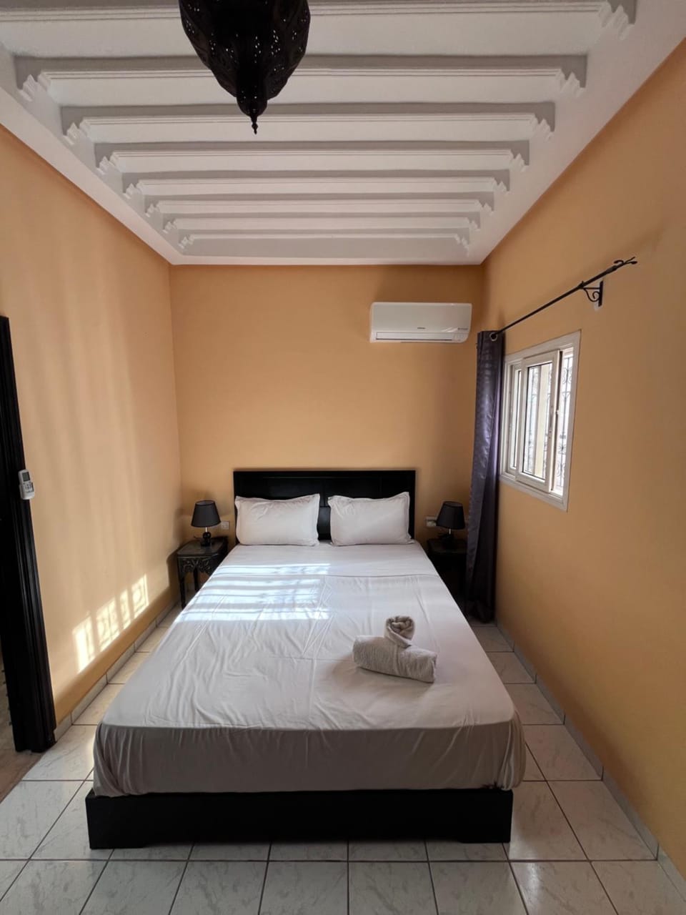 Bed, Photo of the whole room, Bedroom, towels, air conditioner