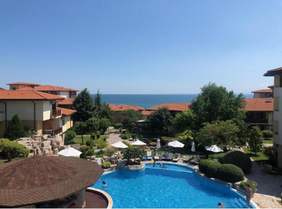 Property building, Day, Natural landscape, Pool view, Sea view, Swimming pool, sunbed