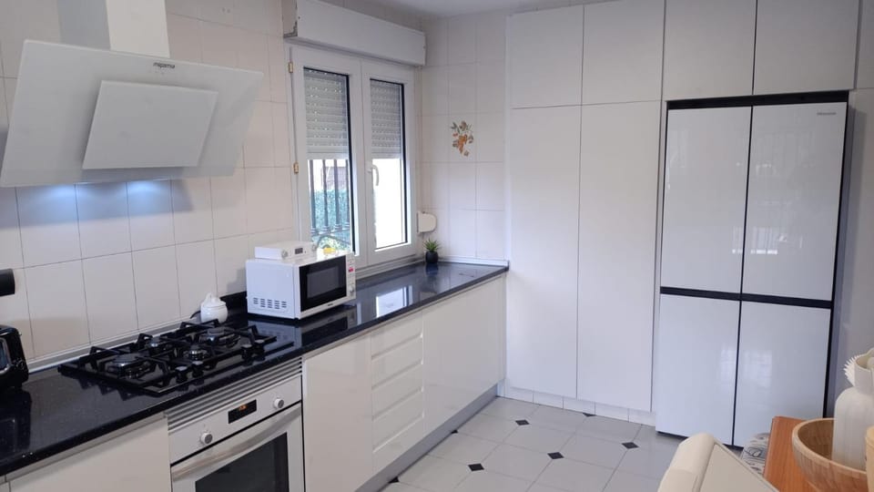 Kitchen or kitchenette, oven, stove