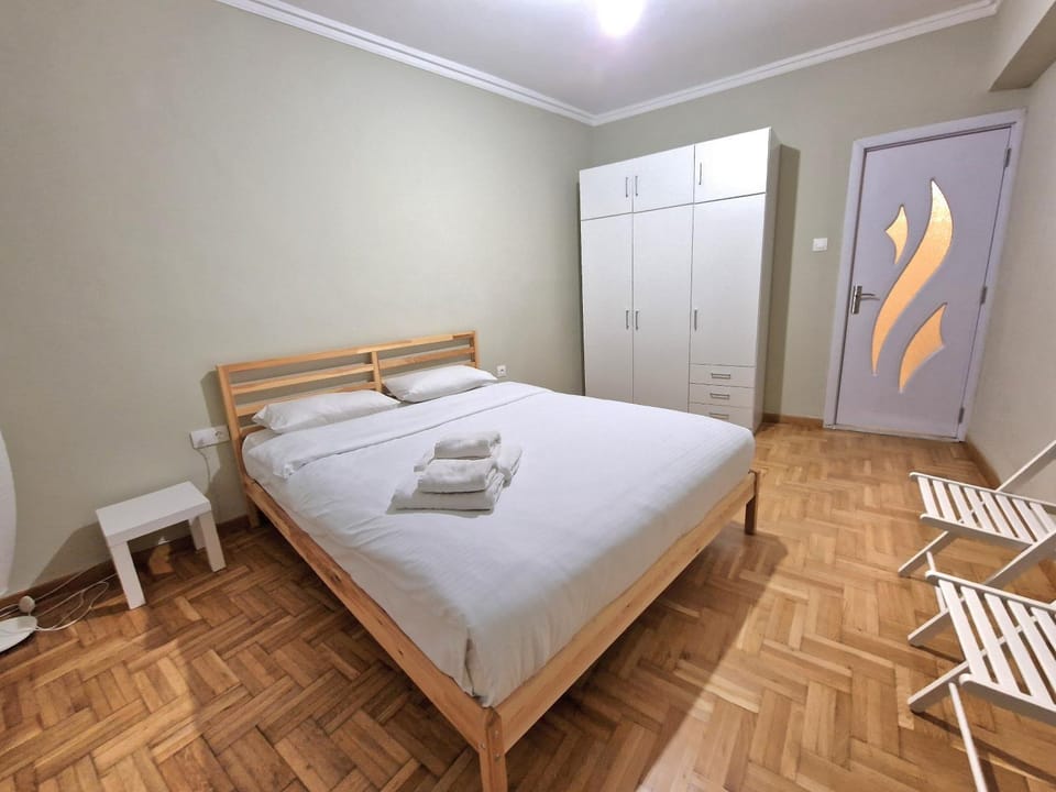 Bed, wardrobe