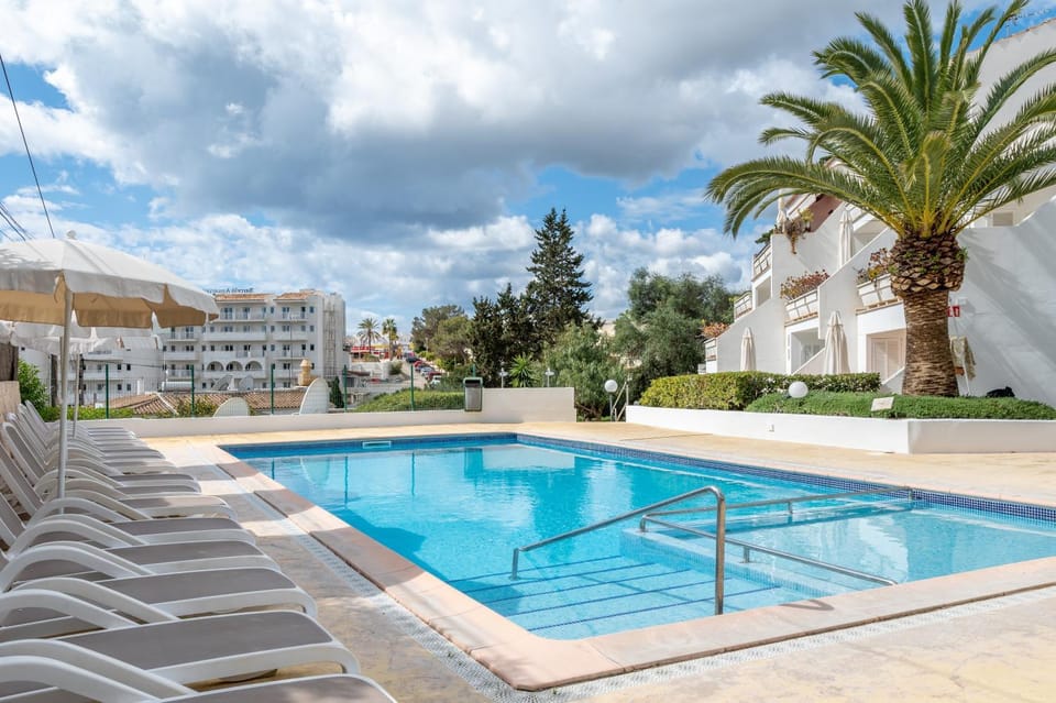Property building, Living room, Swimming pool